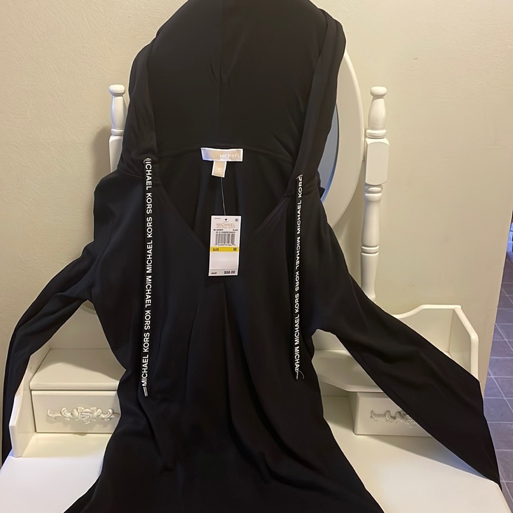 Brand New Michael Kors pull over size medium!